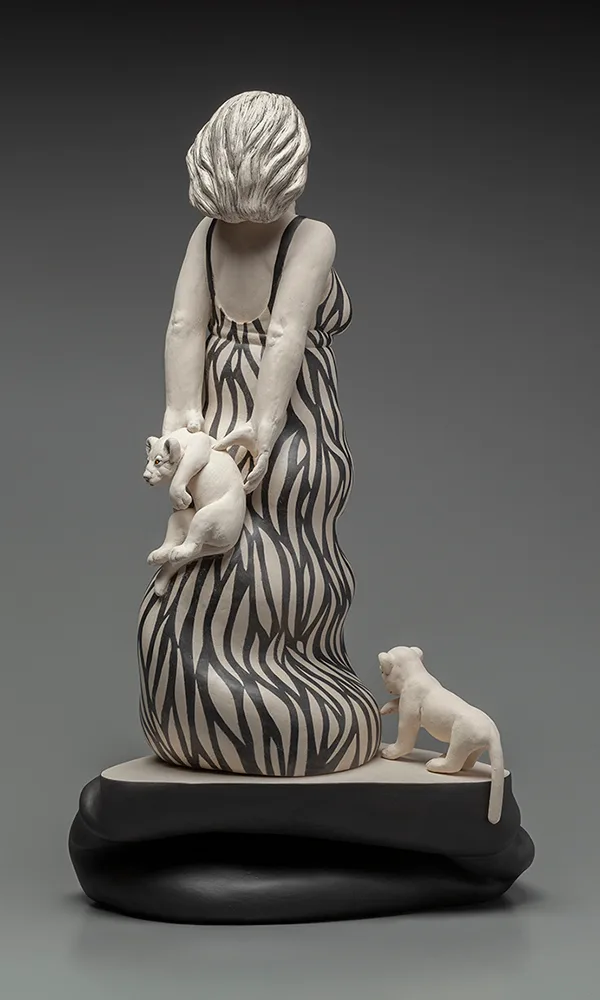 The Lions Sleep Tonight (back) — figurative ceramic sculpture by Claudia Olds Goldie