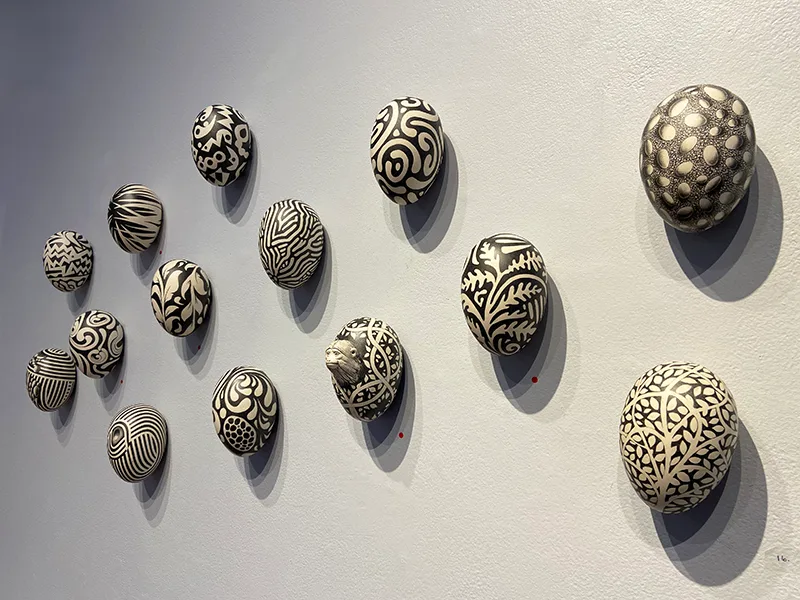 Eggs — ceramic installation by Claudia Olds Goldie