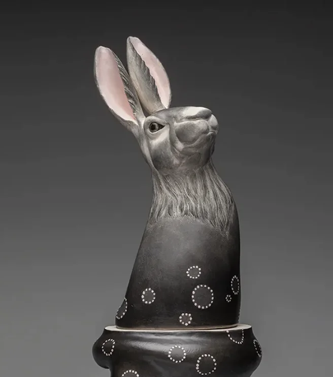 Hop into Wonderland by Claudia Olds Goldie — White stoneware, graphite, paint, 17 x 7 x 7 inches, 2024